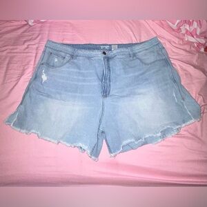 Distressed blue jean shorts